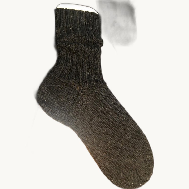 Handgestrickte Wollsocken mit buntem Rautenmuster - ein Unikat aus alpiner Tradition